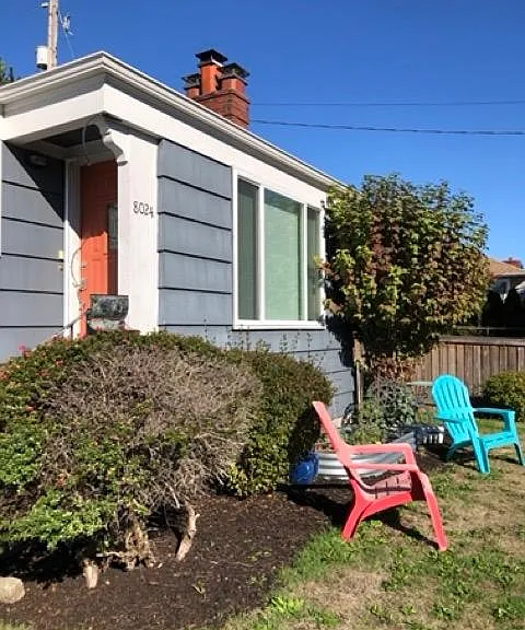 Front door, partially gated front yard
