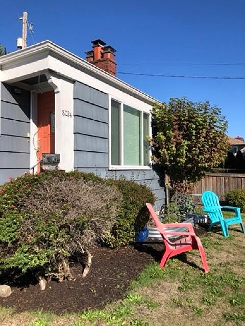 Front door, partially gated front yard