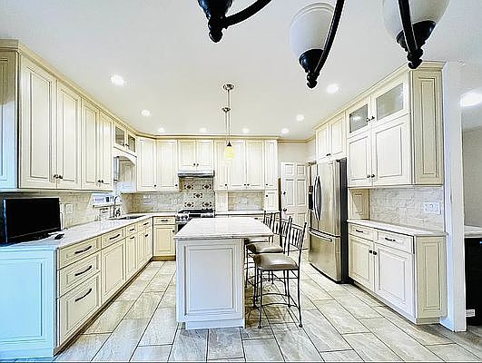 2nd image of 61-39 81st St #1