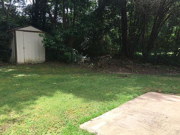 Back yard with matching storage building
