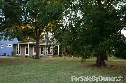Front of House and Front Yard
						:
						This view is what is seen from the gated entry.