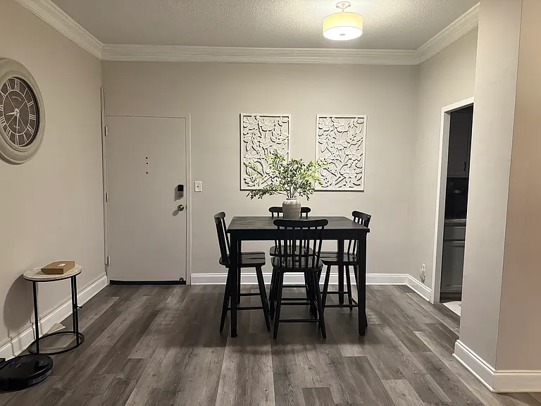 The space comfortably accommodates a dining table and chairs and offers a clean, open feel that's perfect for everyday dining or entertaining guests.
