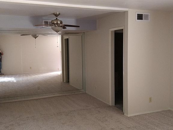 Living room looking at dining room and hall area