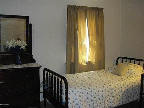 Bedroom has Wood Floor