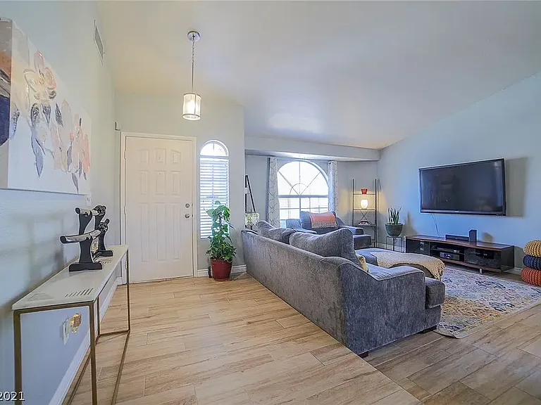 Front door. Sunken living room.