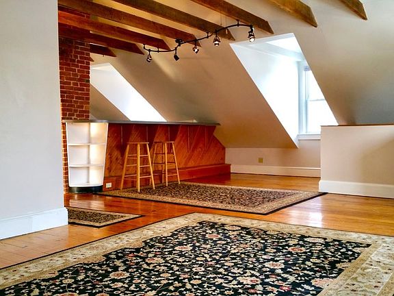 The kitchen has a built in breakfast bar and plenty of room