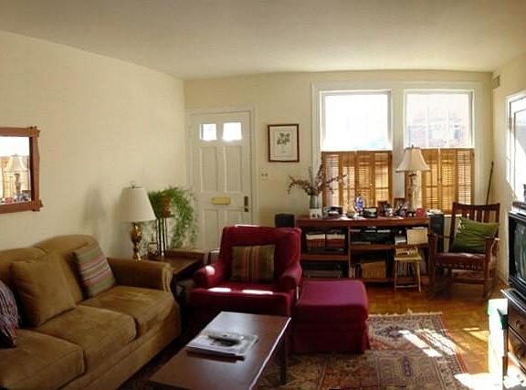 Big sunny living room with hardwood floors
