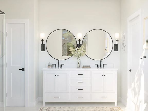 Primary bath with dual sinks and matte black hardware