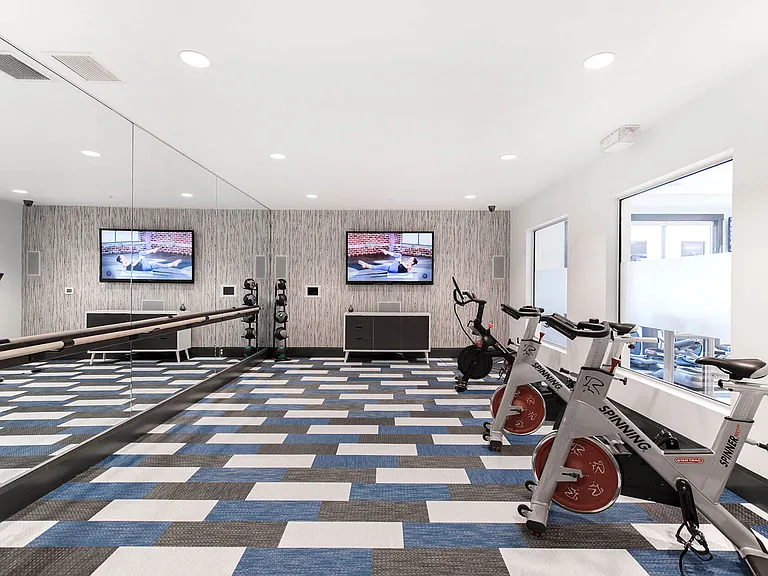 Enjoy our spin and yoga studio with a smart TV programmed with classes