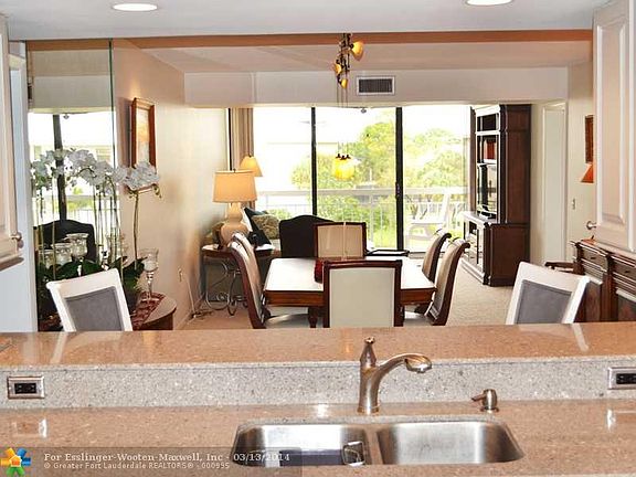 Dual Balcony Penthouse Unit Overlooking Pond and Pool