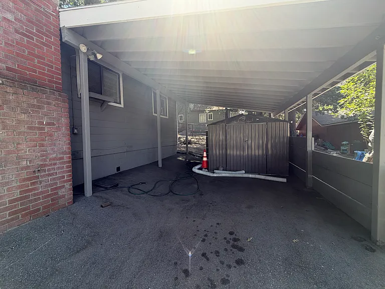 Carport with storage.