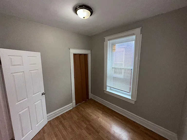 Second bedroom with closet and natural light