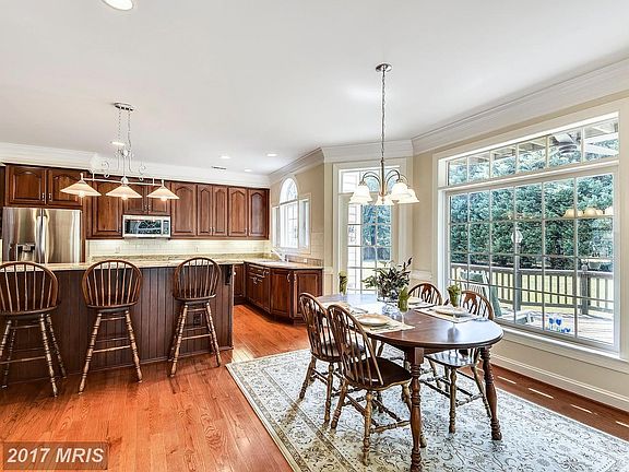 Granite Island in Kitchen seats 5. New Cooktop