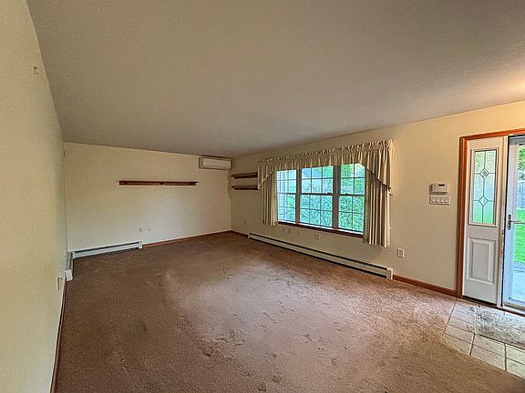 Living room with tiled entry