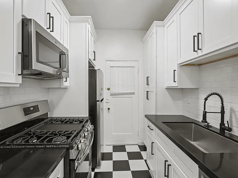 Kitchen with Energy-Efficient Appliances and Ample Cabinet Space
