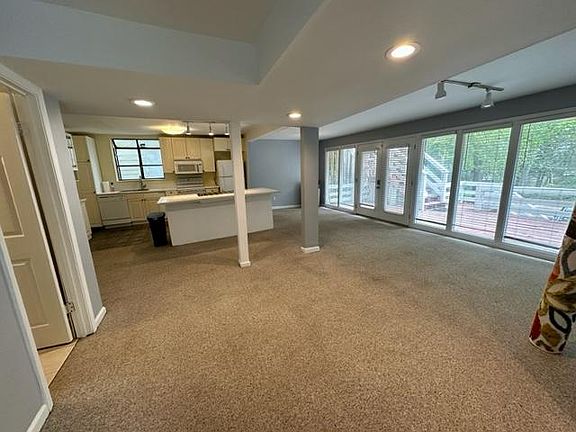 Tons of daylight, wall of glass windows looking at the Deck