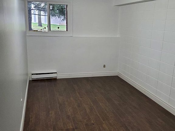 One of three bedrooms