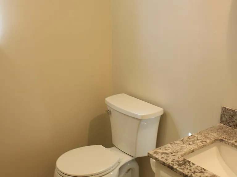 Even the laundry room bath is all new! new vanity top, new paint, new flooring, and new fixtures!