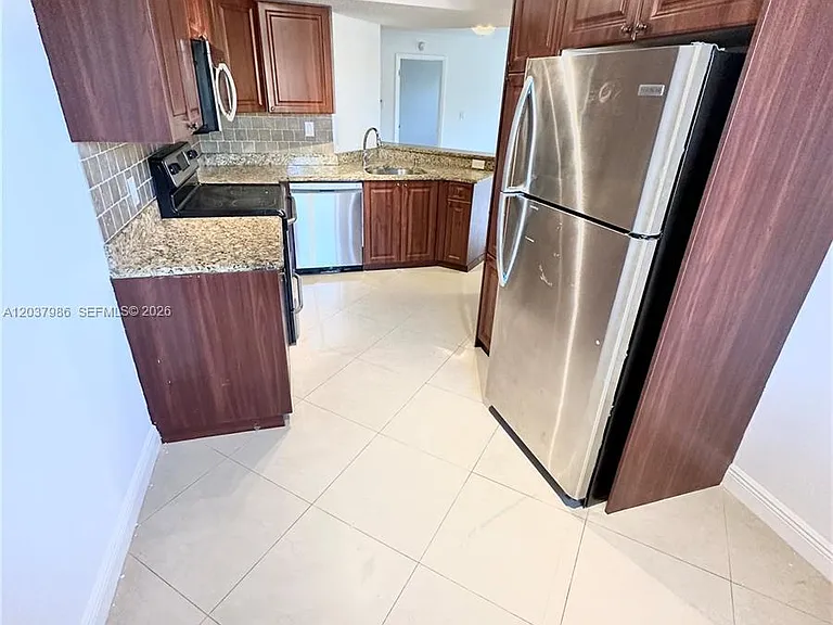 8955 Wiles Rd #208 — Photo 6