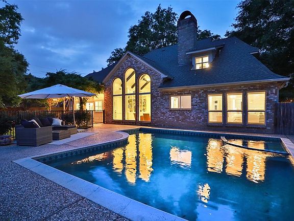 BACKYARD OASIS ; Relax in this fabulous backyard, featuring a fully-fenced pool and spa (resurfaced in 2019).