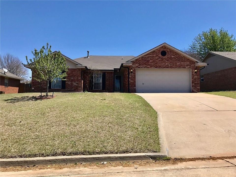 Classic red brick beauty with three bedrooms, 2 baths, large living area, vaulted ceilings, fireplace and fenced yard.