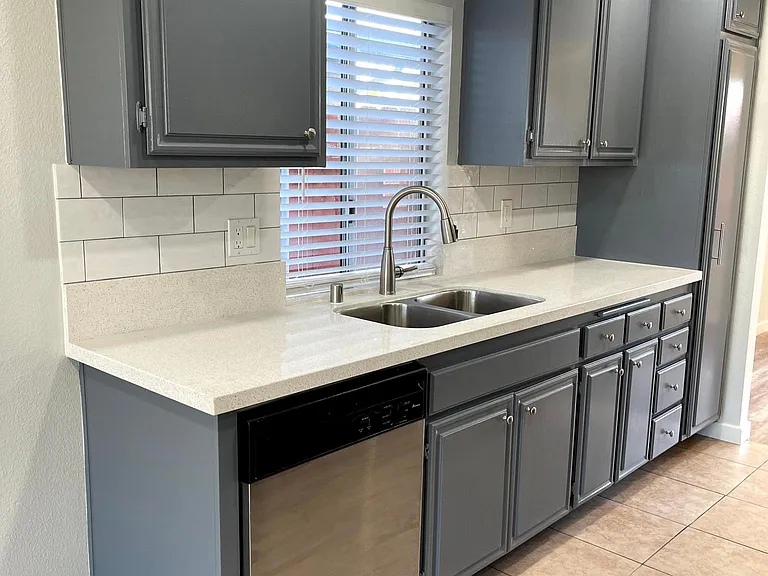 New quartz and newly painted cabinets