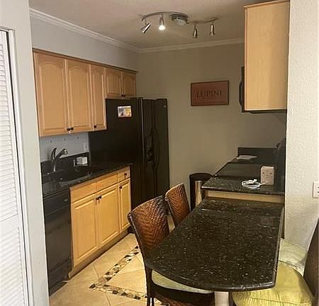 5th image of 616 Executive Center Dr APT 206