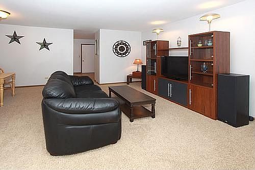 Large living room with newer carpet