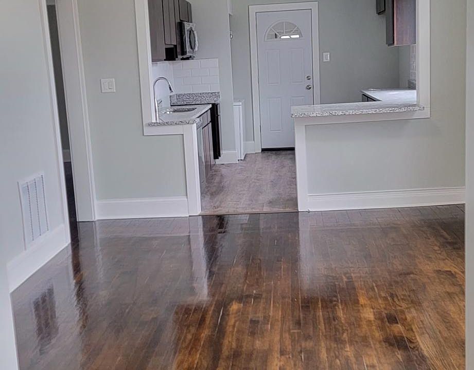 Front entrance looking into the dining room and open kitchen