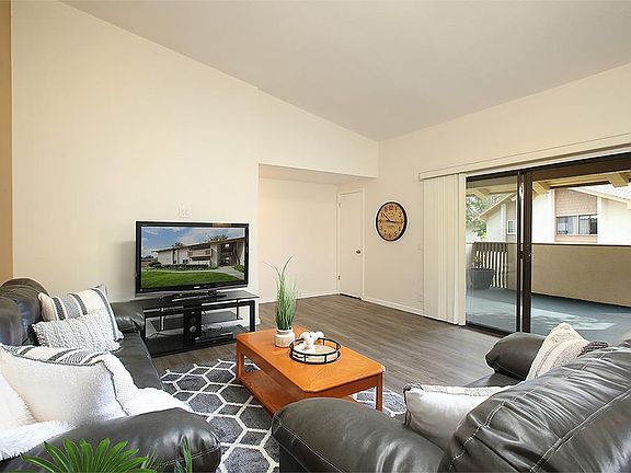 Glass sliders opening to the patio for ideal indoor/outdoor coastal living