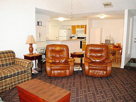 Another view of the family room and the kitchen area.