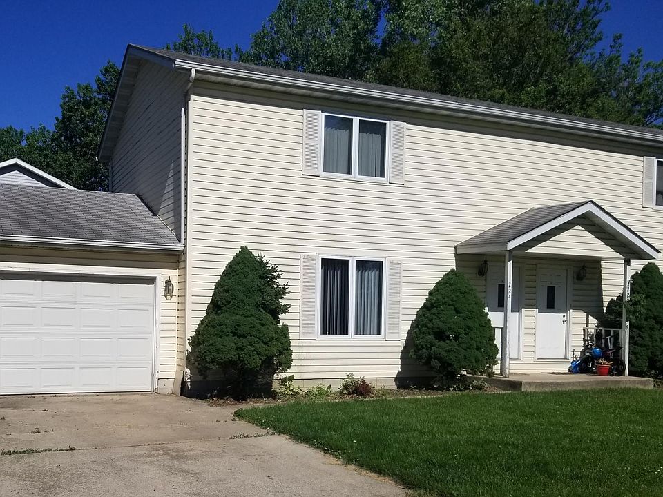 Private attached garage with extra wide driveway