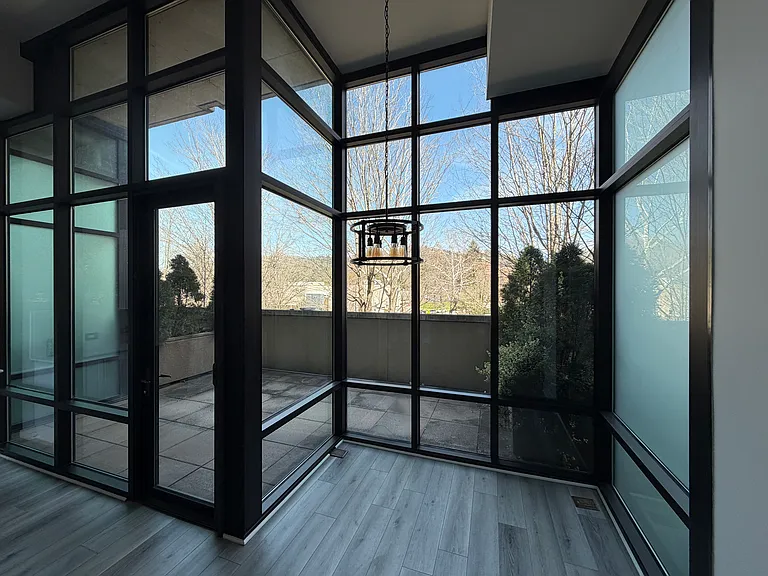 Dining nook and view of private, enclosed patio.