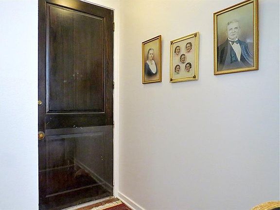 Solid door in entryway.