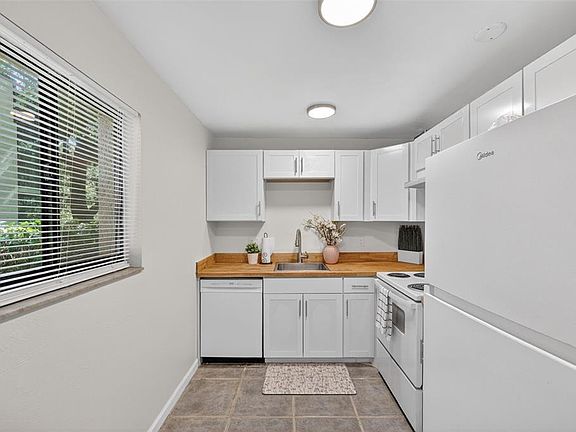 4th image of 11715 Raintree Village Blvd APT A