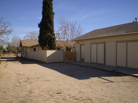 Rear angle of house and garage