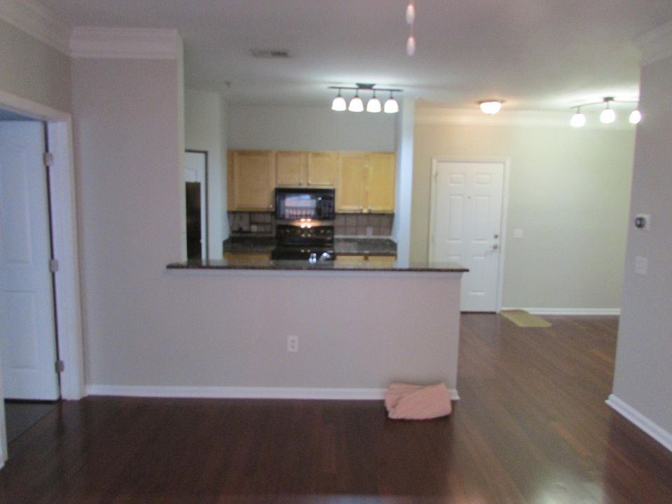 Kitchen and dining area and entry, looking from Living room.