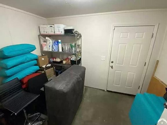 Mudroom for storage, pantry and back yard access.