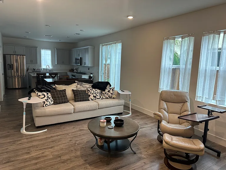 Living room corner looking towards the dining/kitchen area
