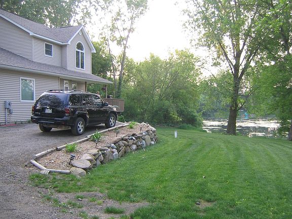 View from driveway to pond