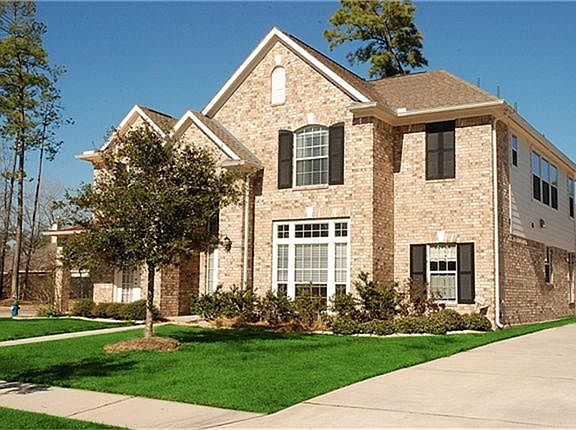 A second view of this lovely home with a detached garage