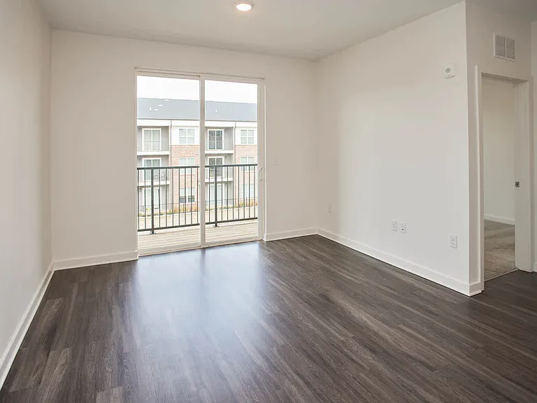 Living Room with Balcony and Hard Surface Flooring