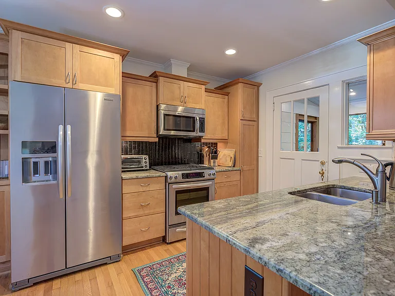 Kitchen with updated appliances.