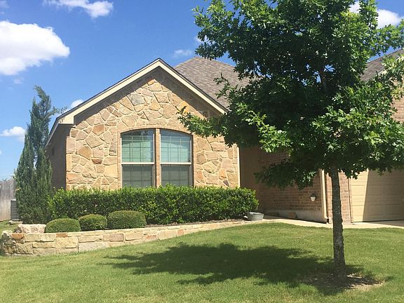 curb view of home, irrigation. Full lawn service