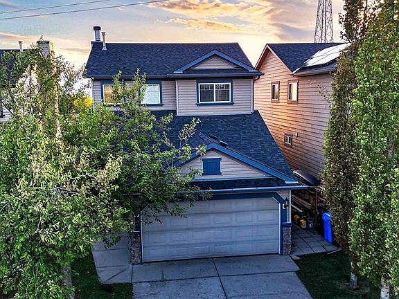 3rd image of 13 E Tuscany Ridge Mews NW