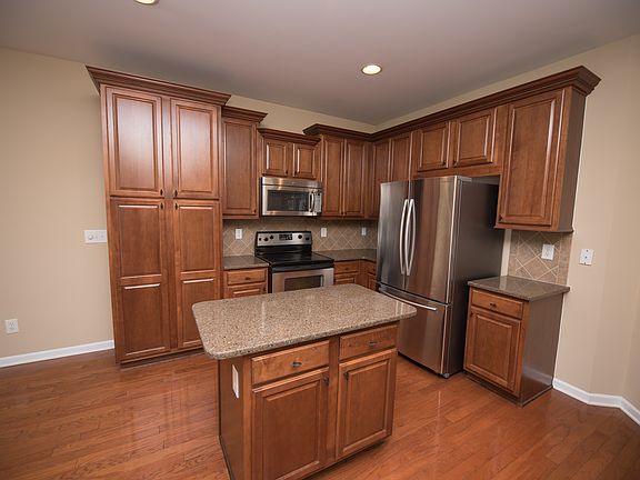Kitchen with stainless steel appliances and granite counter top