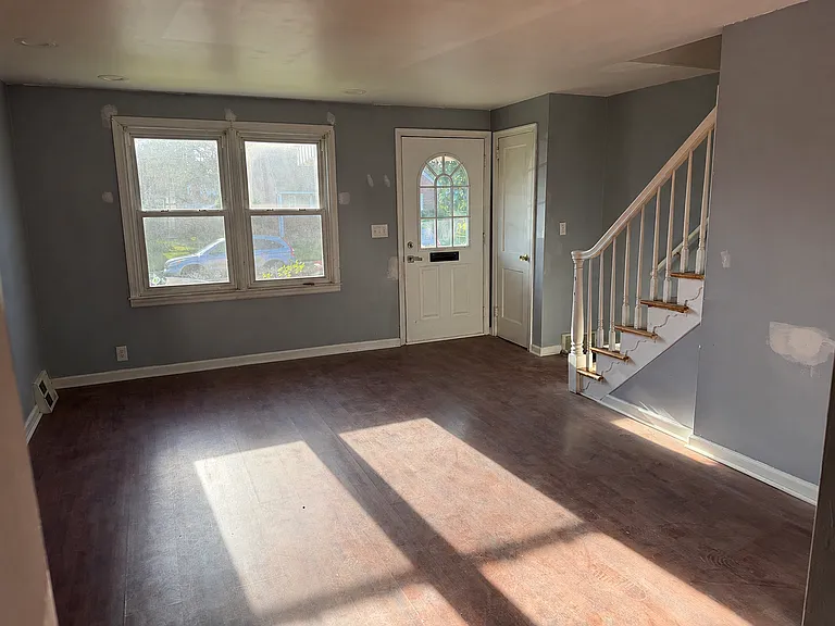 Spacious Living Room with Natural Light- Final Touch Ups in Progress