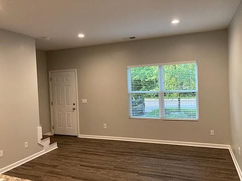 Living room with ample natural lighting