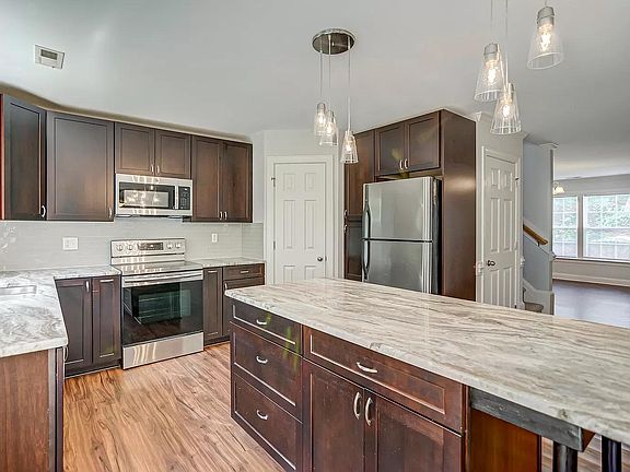 open kitchen with beautiful granite