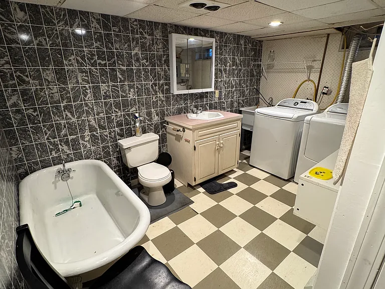 basement laundry room and bathroom